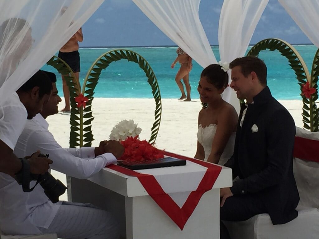 Romancing Maldives: A couple renewing their wedding vows in a perfect beach settin